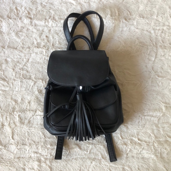 Handbags - NEW Black mini backpack w/ tassels.